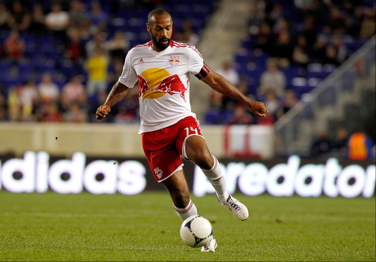 HARRISON, NJ - SEPTEMBER 19: Thierry Henry #14 of New York Red Bulls plays against the Sporting KC during their match at Red Bull Arena on September 19, 2012 in Harrison, New Jersey. (Photo by Jeff Zelevansky/Getty Images)