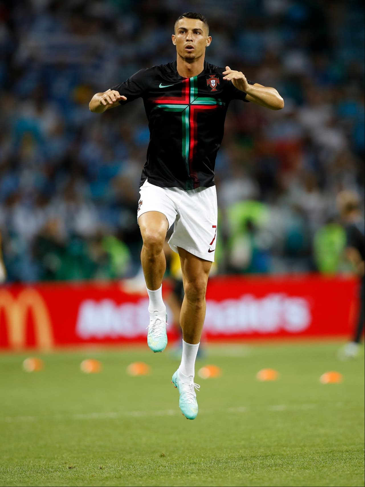 Portugal's Cristiano Ronaldo arrives on the pitch prior the round of 16 match between Uruguay and Portugal at the 2018 soccer World Cup at the Fisht Stadium in Sochi, Russia, Saturday, June 30, 2018. (AP Photo/Francisco Seco)