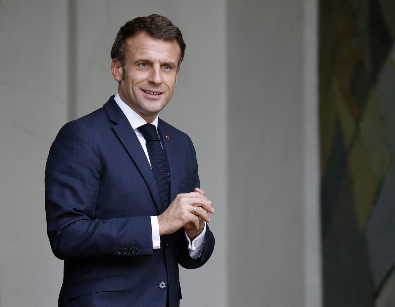 's President Emmanuel Macron looks on as Colombian President leaves after talks as part of the Paris Peace Forum the presidential Elysee Palace, in Paris, on November 10, 2022. (Photo by Ludovic MARIN / AFP) (Photo by LUDOVIC MARIN/AFP via Getty Images)