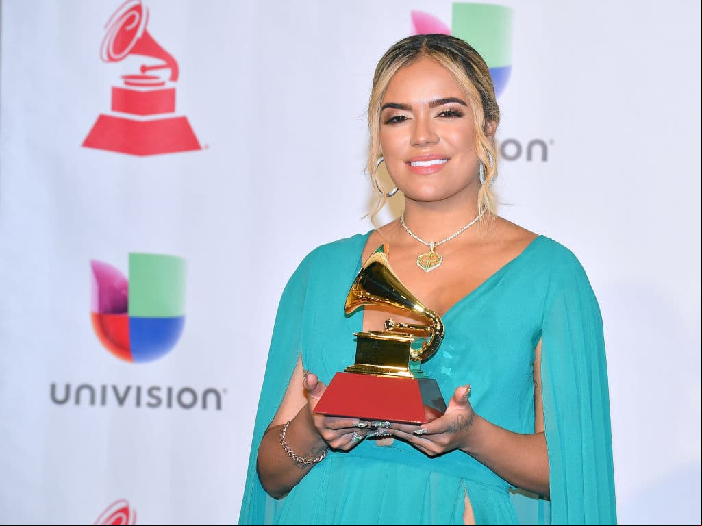 En 2006, Karol G participó en 'The X Factor', donde se abrió al mundo de la música.