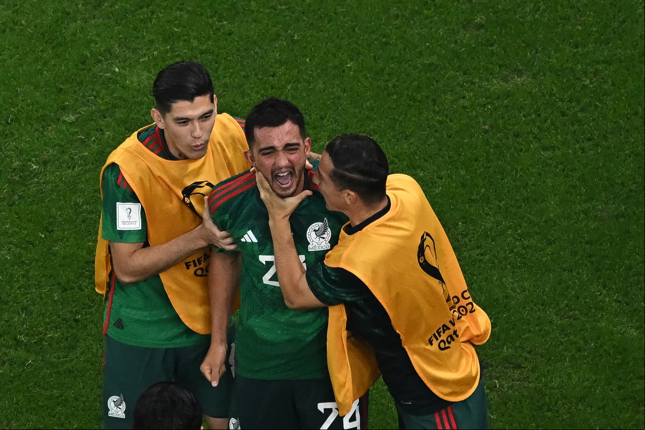 Mexico's midfielder #24 Luis Chavez celebrates with teammates after scoring his team's second goal from a free-kick during the Qatar 2022 World Cup Group C football match between Saudi Arabia and Mexico at the Lusail Stadium in Lusail, north of Doha on November 30, 2022. (Photo by MANAN VATSYAYANA / AFP) (Photo by MANAN VATSYAYANA/AFP via Getty Images)